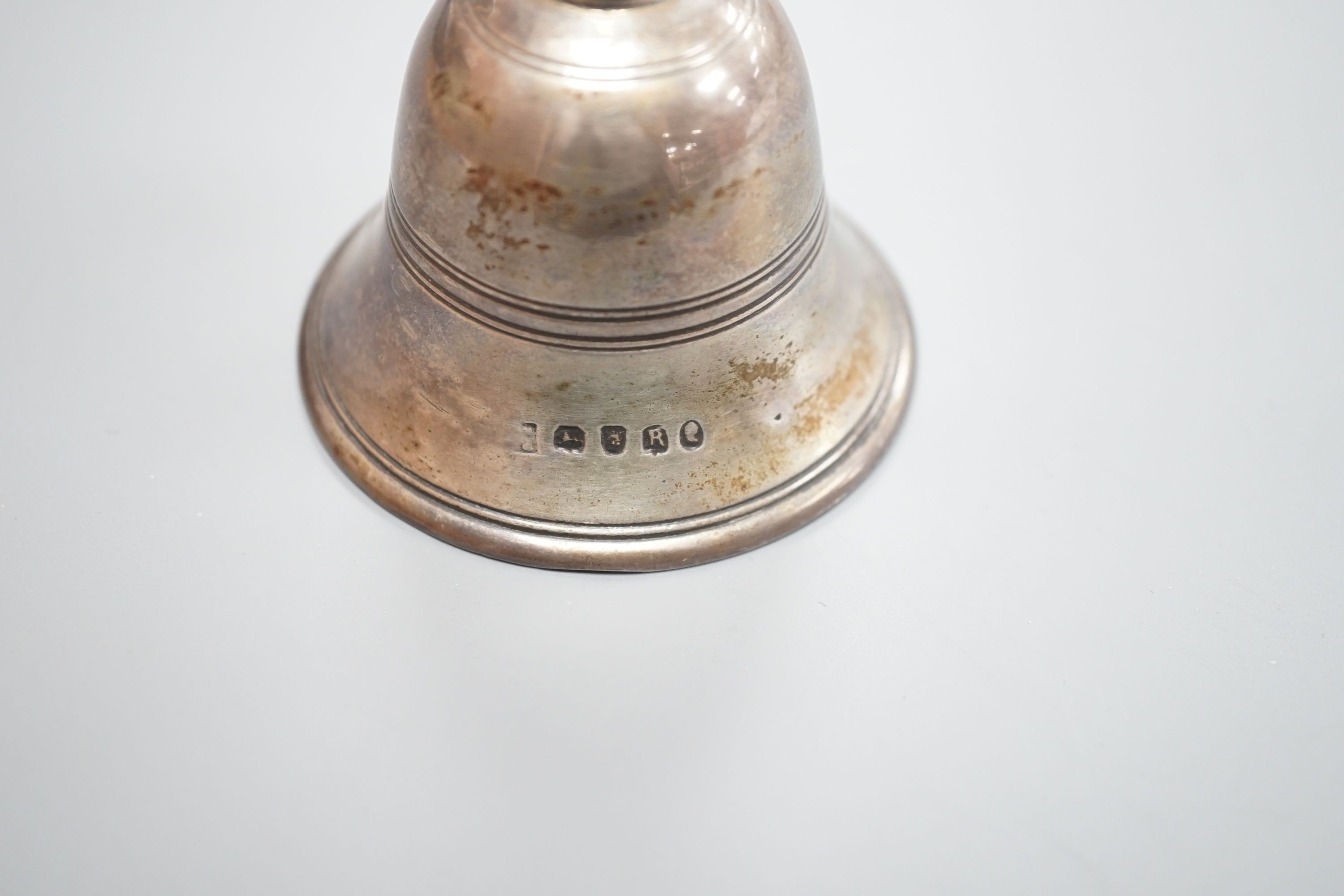A George III silver hand bell, London, 1812, 11.5cm.